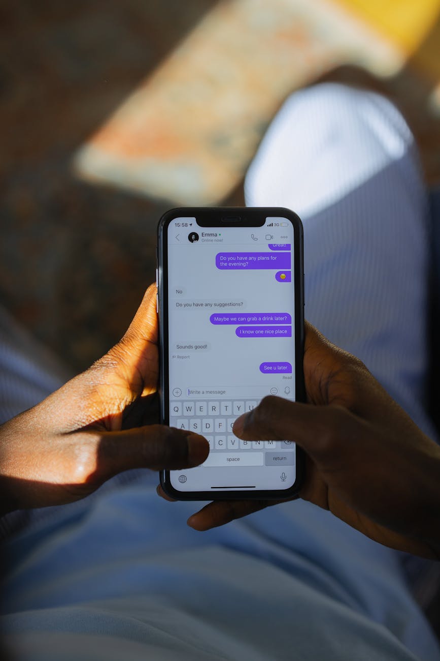 person using smartphone for messaging